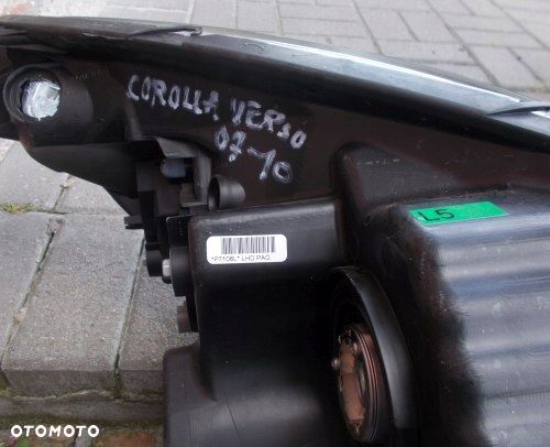 TOYOTA COROLLA VERSO LIFT 07- CIEMNA LEWA PRZEDNIA LAMPA ORYGINAŁ - 14