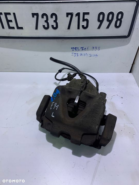 ZACISK HAMULCOWY LEWY 5724 BMW E90 E91 320d - 3