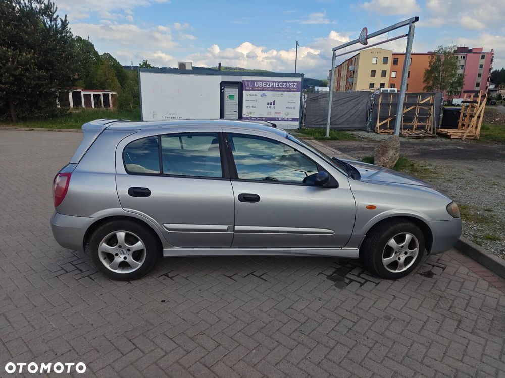 Nissan Almera 1.5 Visia + - 8