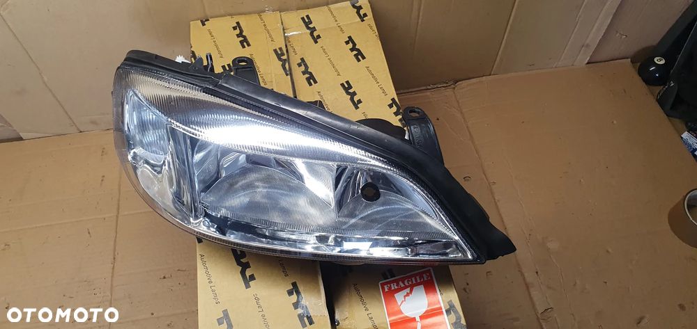 Lampa prawy przód przednia prawa Opel Astra G TYC Nowa 20-5487-08-2 - 7