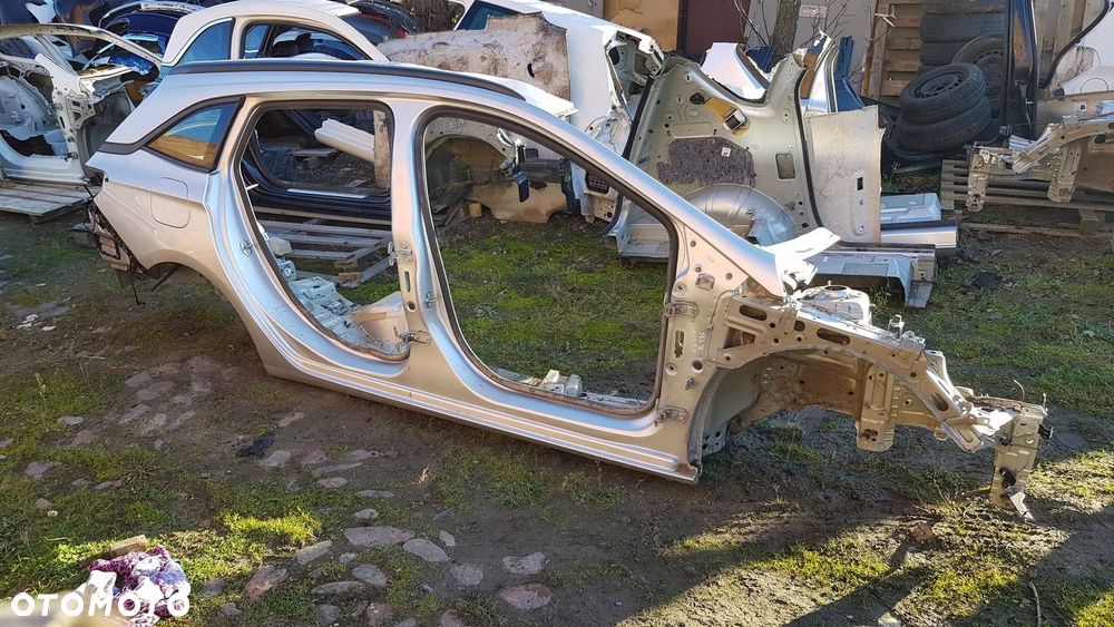 fartuch błotnik prawy tył Opel Astra K kombi - 1