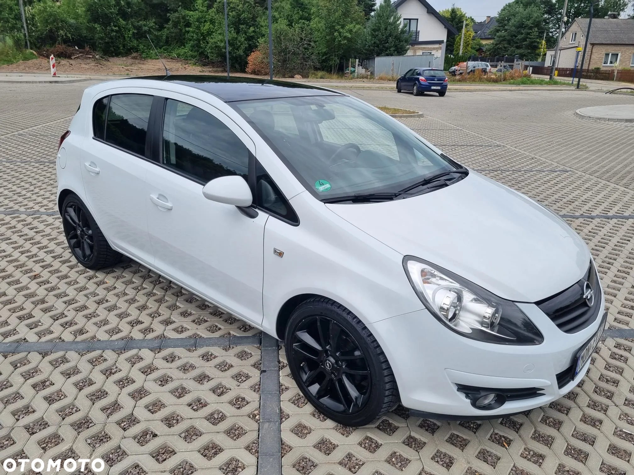 Opel Corsa 1.4 16V Cosmo - 13