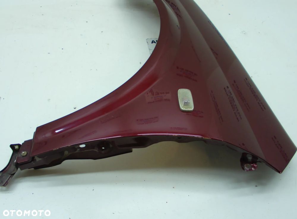 Nissan Primera P12 Błotnik prawy lewy przód bordowy - 6