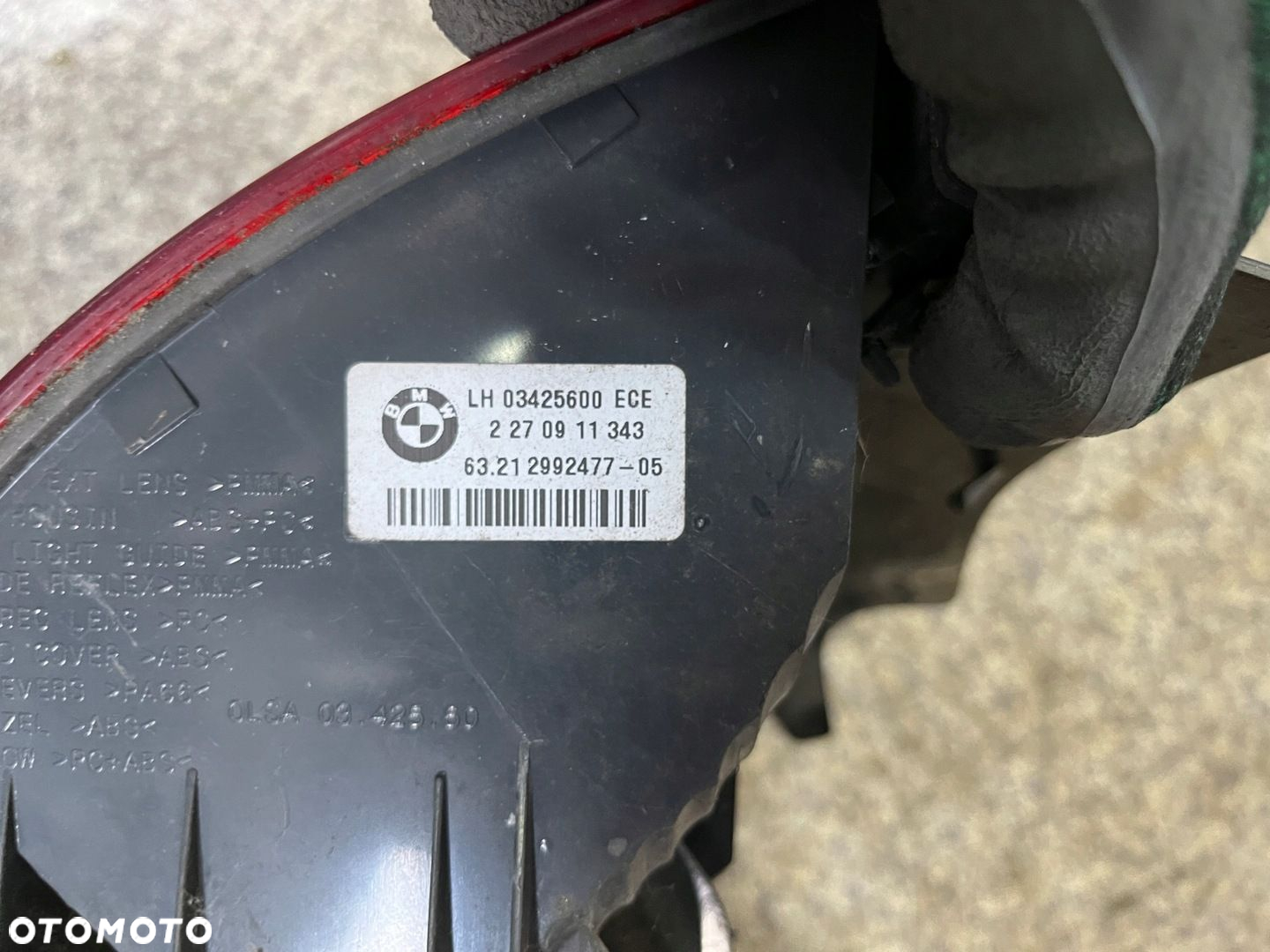 Lampa lewy tyl lewa tylna w blotnik BMW E84 X1 2011 ORYGINALNA - 7