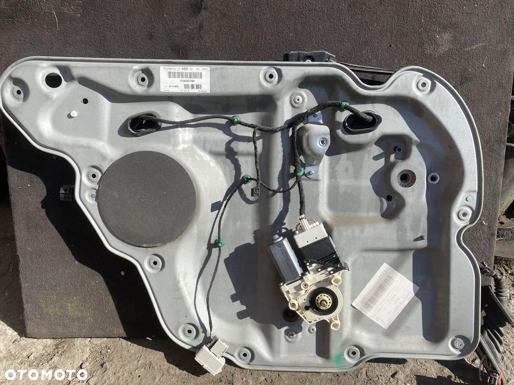 Podnośnik silniczek szyby Volkswagen Touran I lewy tył OE - 1