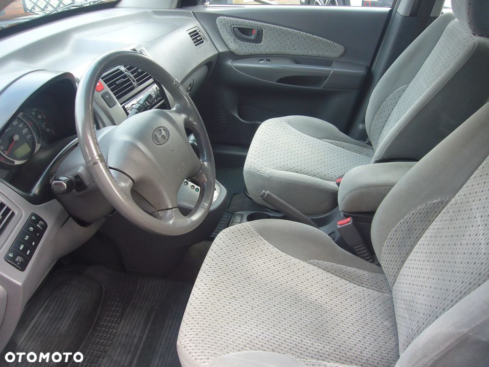 Hyundai Tucson 2.0 CRDi Elegance + - 11