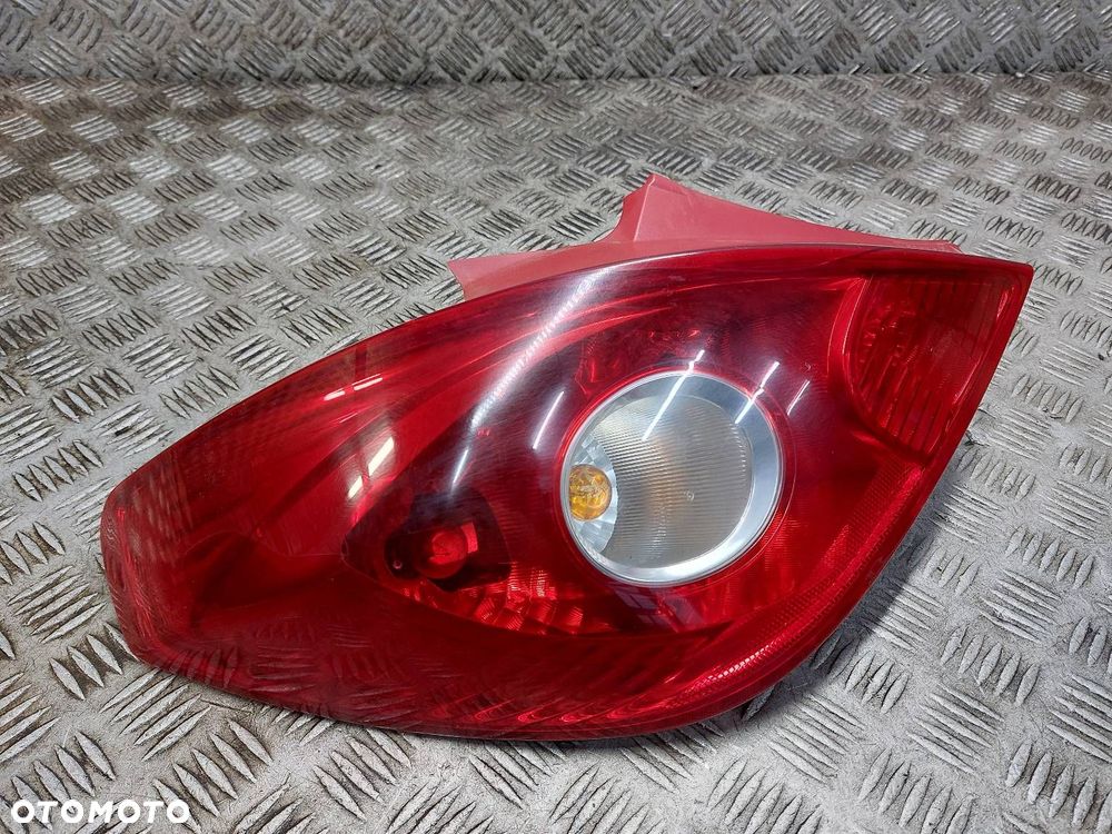 LAMPA LEWY TYŁ + WKŁAD OPEL CORSA D 13186350 89037853 - 2