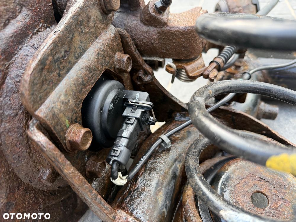 BELKA TYLNA HYUNDAI I10 07- OŚ SPRĘŻYNY ZACISK - 11
