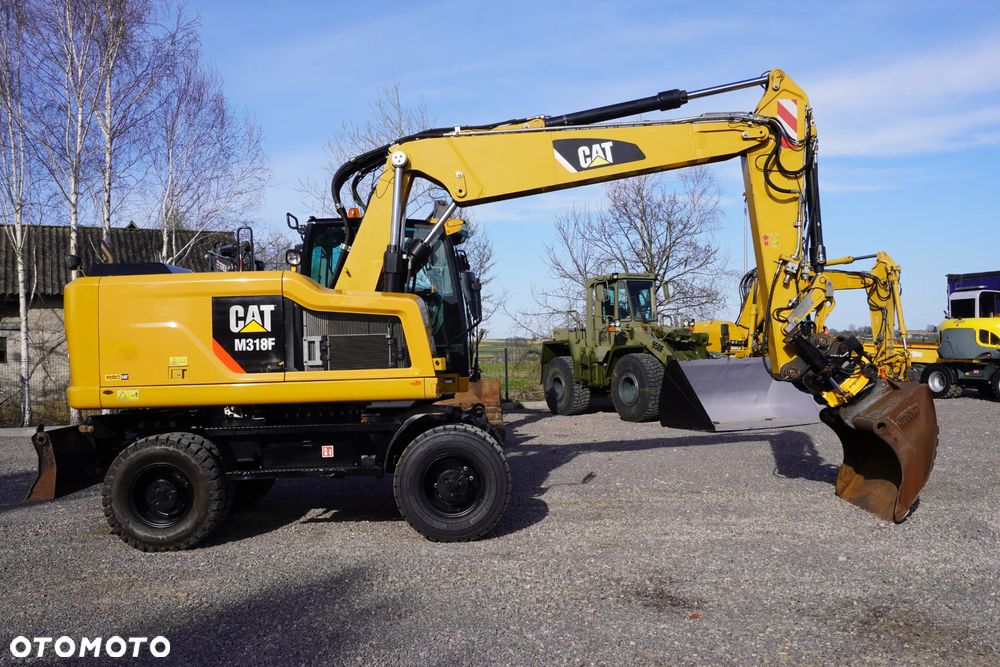 Caterpillar 318 F - 9