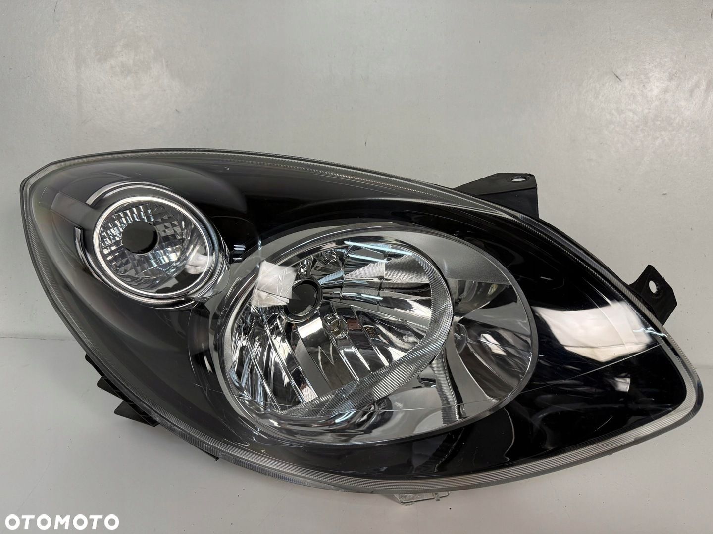 LAMPA PRZOD PRZEDNIA PRAWA RENAULT TWINGO II 2 2007- CZARNA GT EUROPA CALA - 1