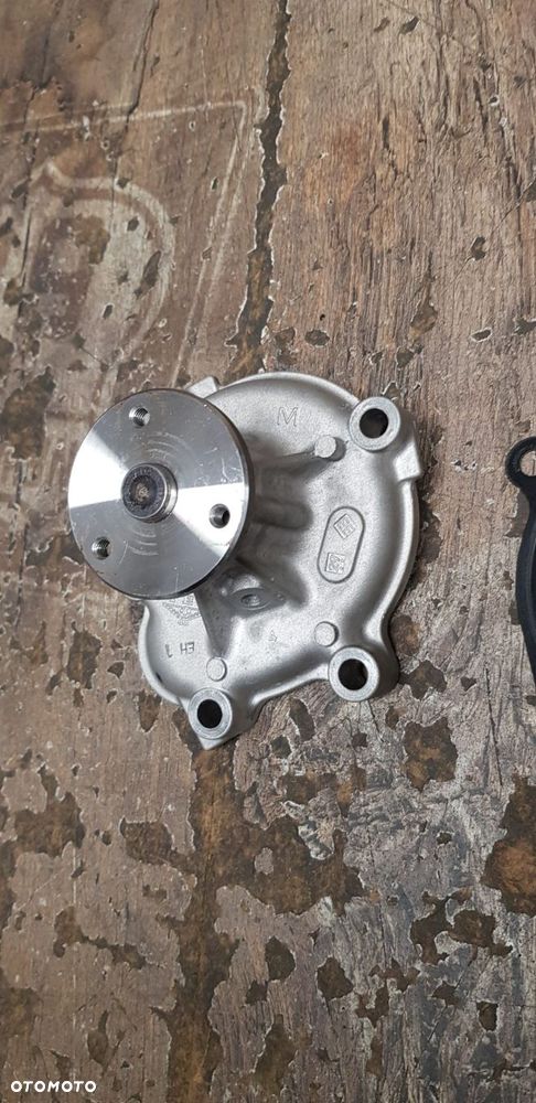 Oryginalna pompa wody Opel Astra Corsa Zafira Meriva 98003100 - 5