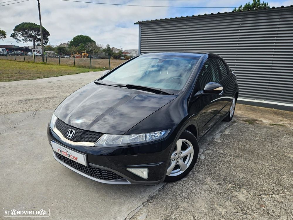 Honda Civic 1.4 i-VTEC Elegance - 1