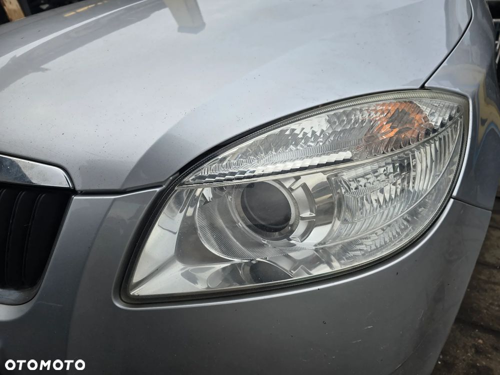 Reflektor lewy przód fabia II soczeweka przedlift - 1