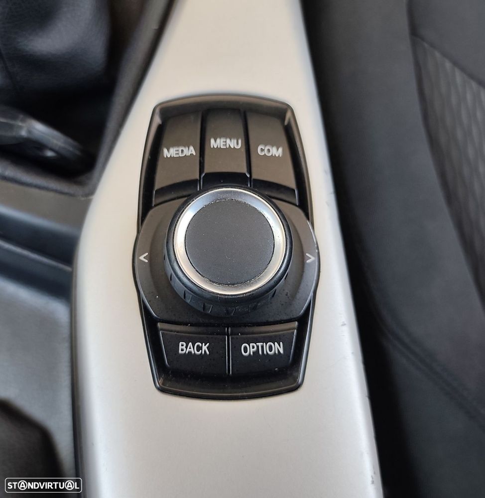 BMW 116 i Advantage — fotografia 11