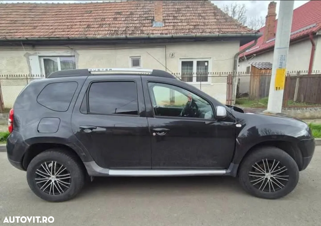 Dacia Duster 1.6 4x4 - 7