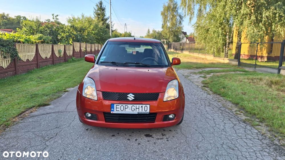 Suzuki Swift 1.3 Club - 4