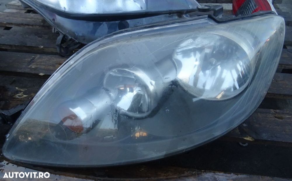 Far stanga Volkswagen Golf 5 plus din 2006 volan pe stanga - 1