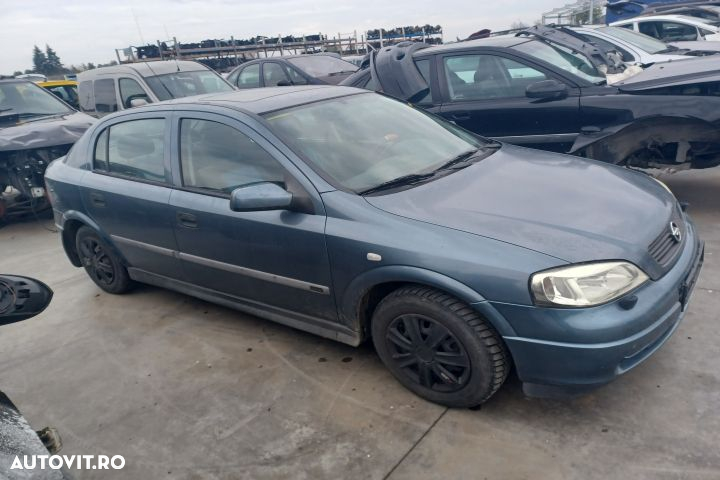 Polita portbagaj Opel Astra G  [din 1998 pana  2009] seria Hatchback 5-usi 1.6 MT (101 hp) - 3