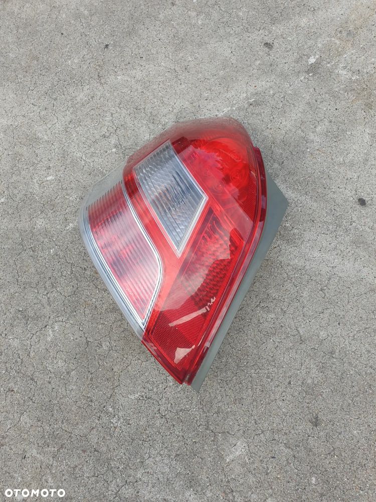Lampa Lewa Tylna Toyota Yaris II Lift demontaż oryginał - 3