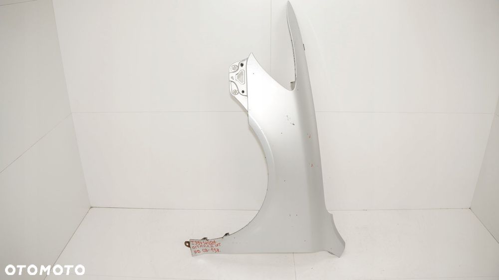 BŁOTNIK LEWY PRZÓD SKODA OCTAVIA II LIFT 08-13R LA7W - 12