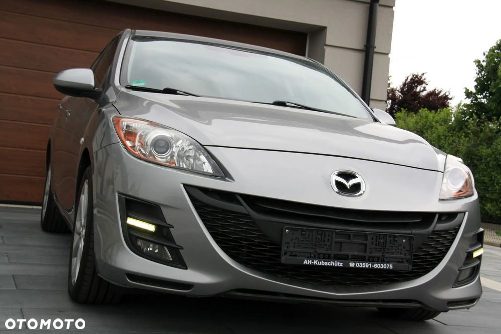 Mazda 3 2.0 MZR DISI High-Line - 2