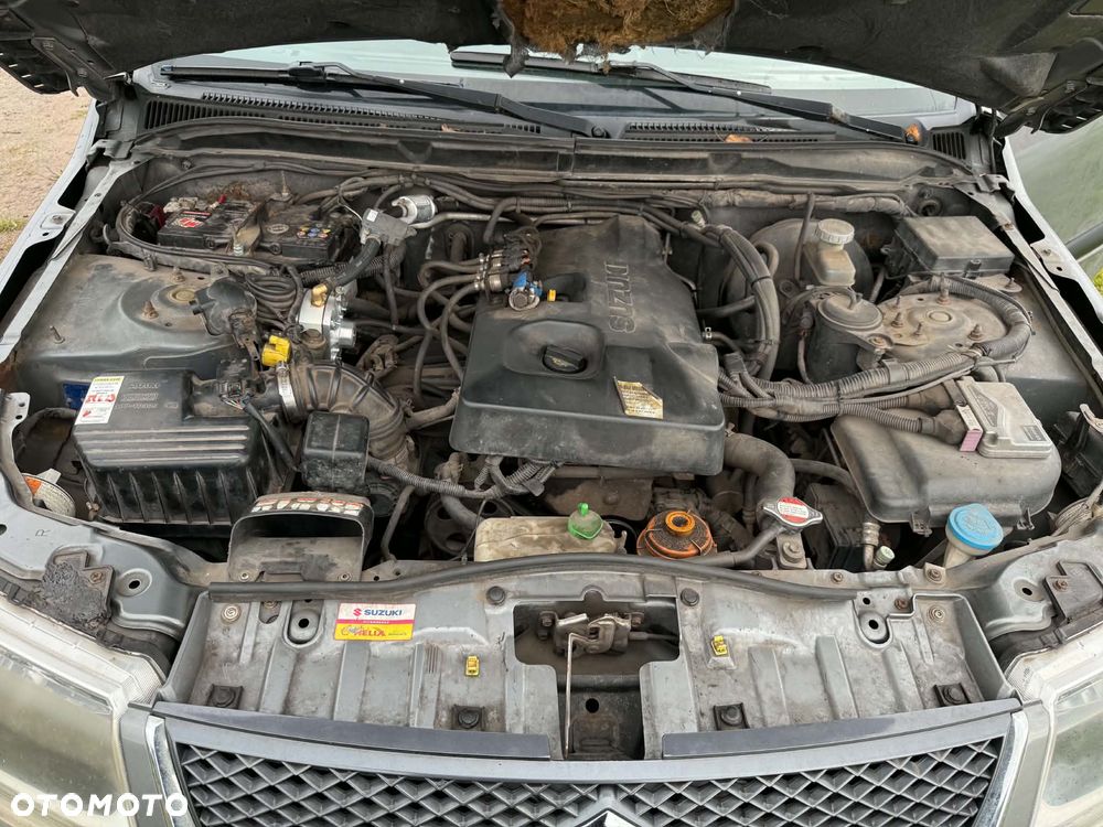 Suzuki Grand Vitara 2.0 - 7