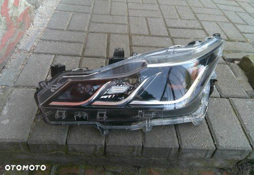TOYOTA COROLLA E21 SEDAN ZWYKŁA SOCZEWKA LEWA PRZEDNIA 81150-02T31-00 - 1