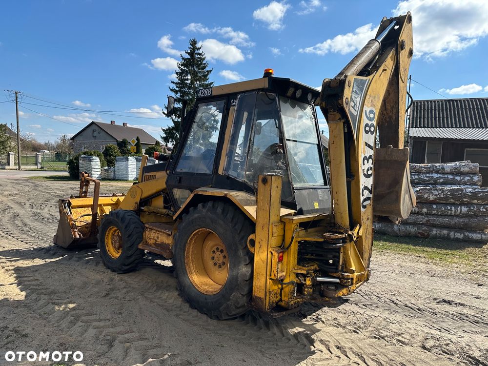 Caterpillar 428B ramię typu Banan - 12
