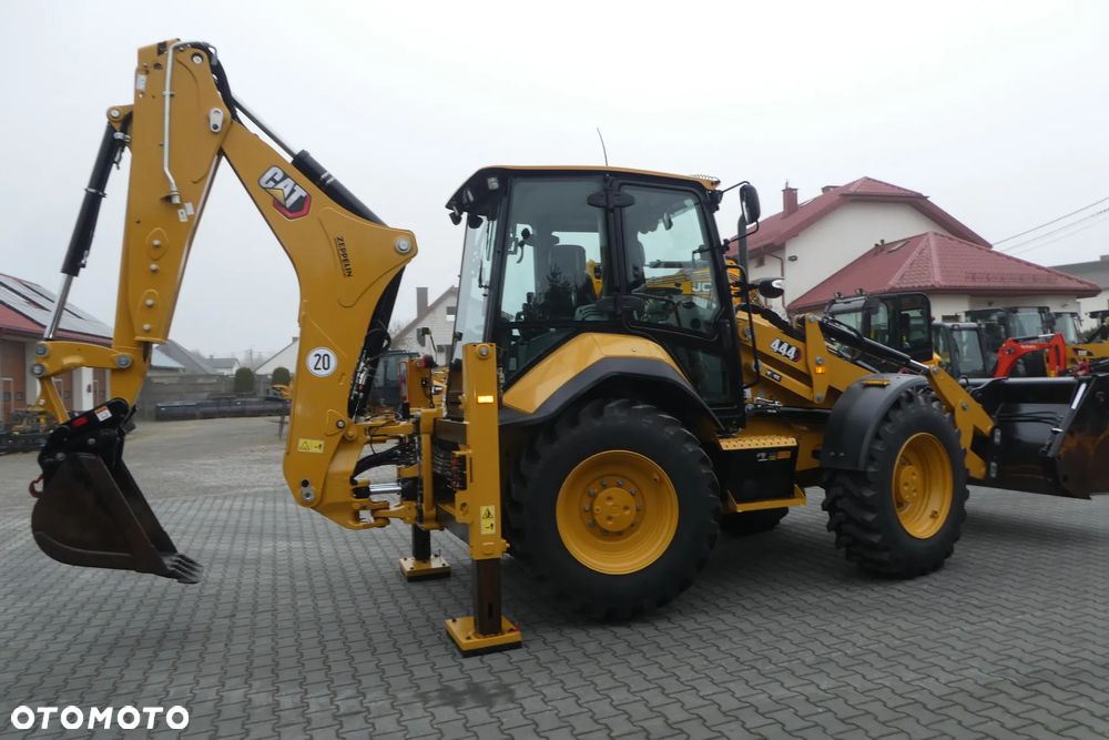 Caterpillar 444 -O7A Z NIEMIEC - 7