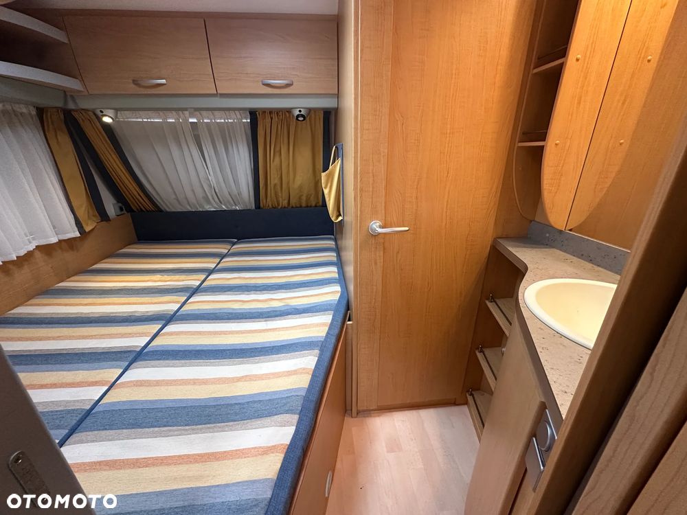 KNAUS 500 SUDWIND z przedsionkiem, napędem i łóżkami piętrowymi. - 31