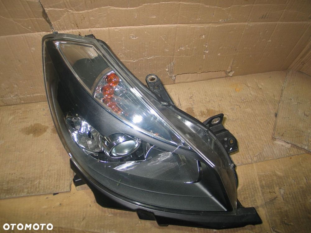 Lampa przod renault clio 3 III 05-12r. 8200261612 europa - 3