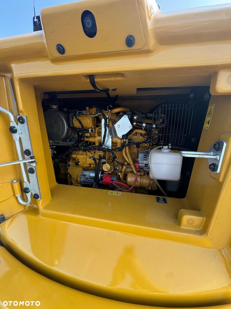 Caterpillar 310 - 21