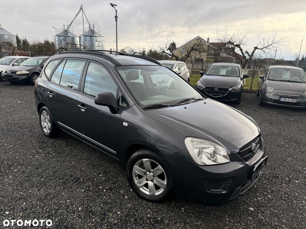 Kia Carens 2.0 CVVT EX - 1