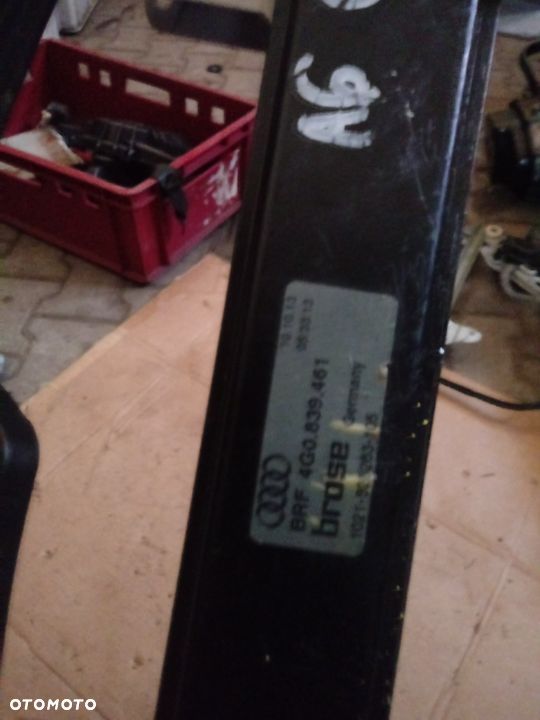 MECHANIZM OPUSZCZANIA SZYBY AUDI A6 S6 C7 4G0839461 - 2