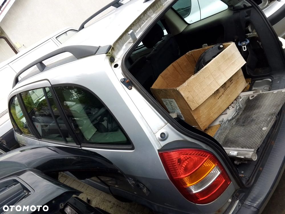 Opel Zafira A (99-03r.) 1.6 B 100KM. Silnik X16XEL  (Z16XE) Skrzynia MG4 (F17C419) lakier Z147 (82L). Cały na części. GWARANCJA !!!  Przód Tył Zestaw Komplet Drzwi Klapa Zderzak Błotnik Maska Grill Atrapa Szyba Pas Lampa Lusterko Boczki Fotel Kanapa Kokpit Deska Rozdzielcza Przełącznik Włącznik Sterownik Przewody Wiązka Instalacja Moduł Komputer Czujnik Listwa Pompa Alternator Wtryski Głowica Rozrusznik Kompresor Sprzęgło Dwumas Silnik Skrzynia ABS Klimatyzacji Paliwa Wspomagania Kolektor Turbina Przepustnica Zawór Chłodnica Koło Hak Belka Sanki Zawieszenie Mcpherson Półoś Amortyzator Wydech Tłumik Zacisk Most - 4