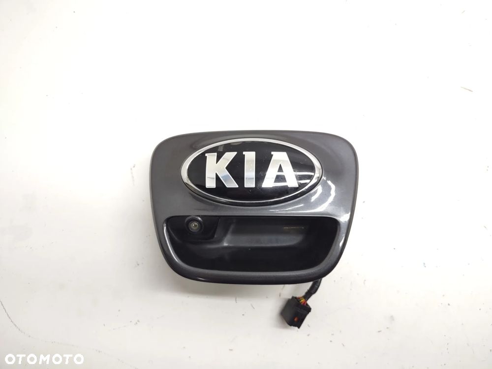 KLAMKA KLAPY BAGAŻNIKA KAMERA COFANIA 95760-H8000 KIA RIO IV TYLNA GRAFITOWA ABT ORYGINAŁ