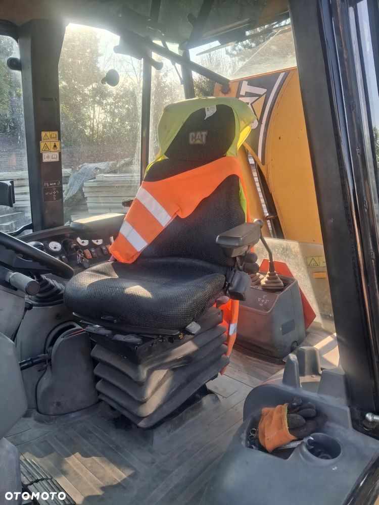 Caterpillar 428D - 11