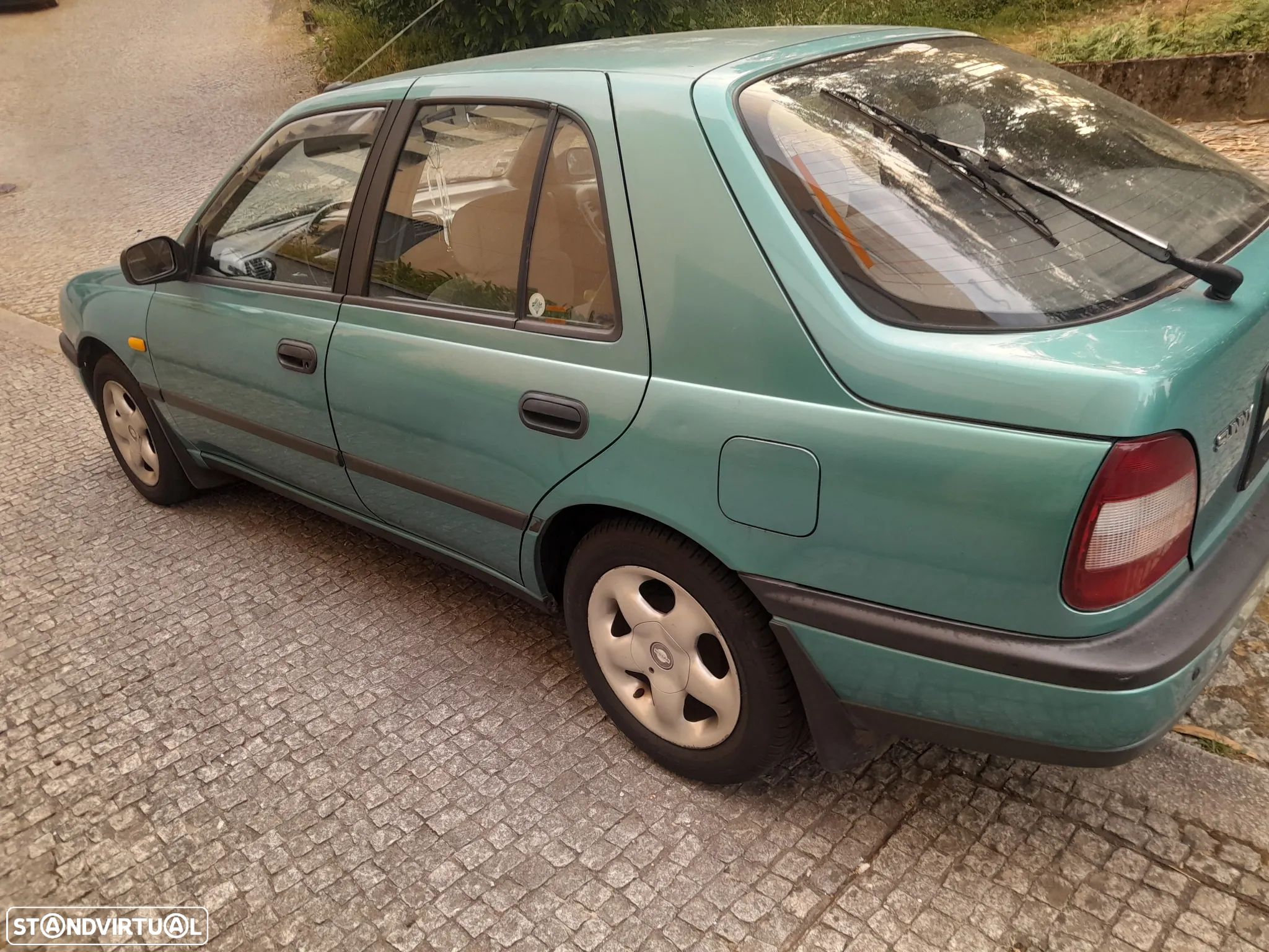 Nissan Sunny Hatchback 1.4 SLX - 1