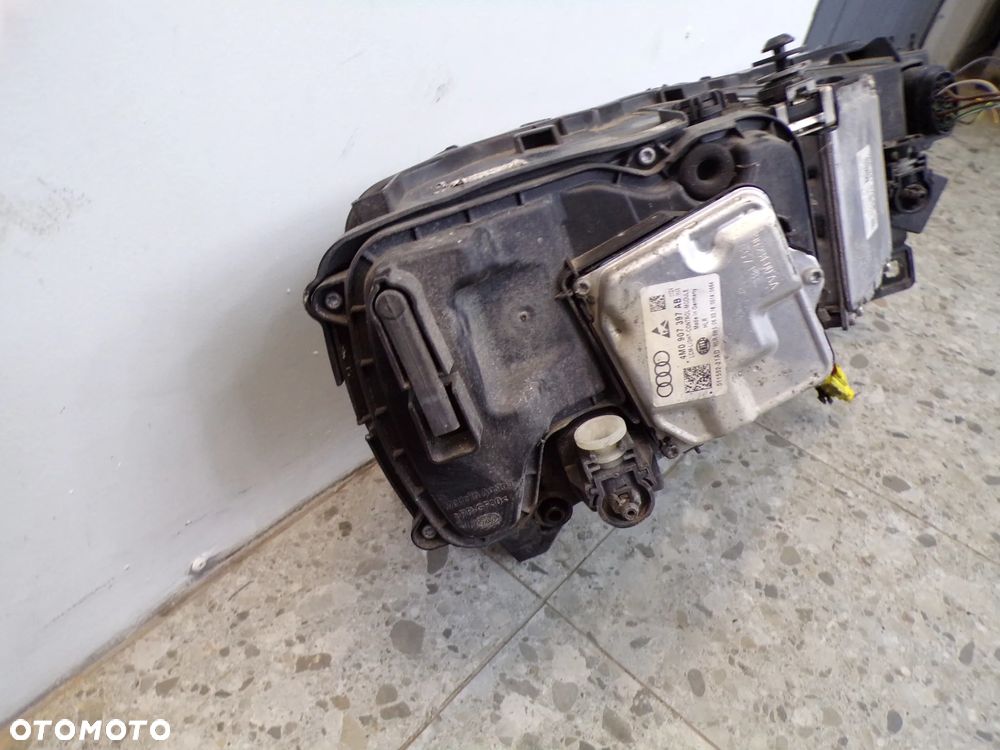LAMPA LEWY PRAWY PRZÓD AUDI Q7 - 10