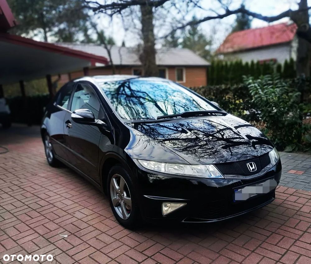 Honda Civic 1.4 i-VTEC Elegance - 1