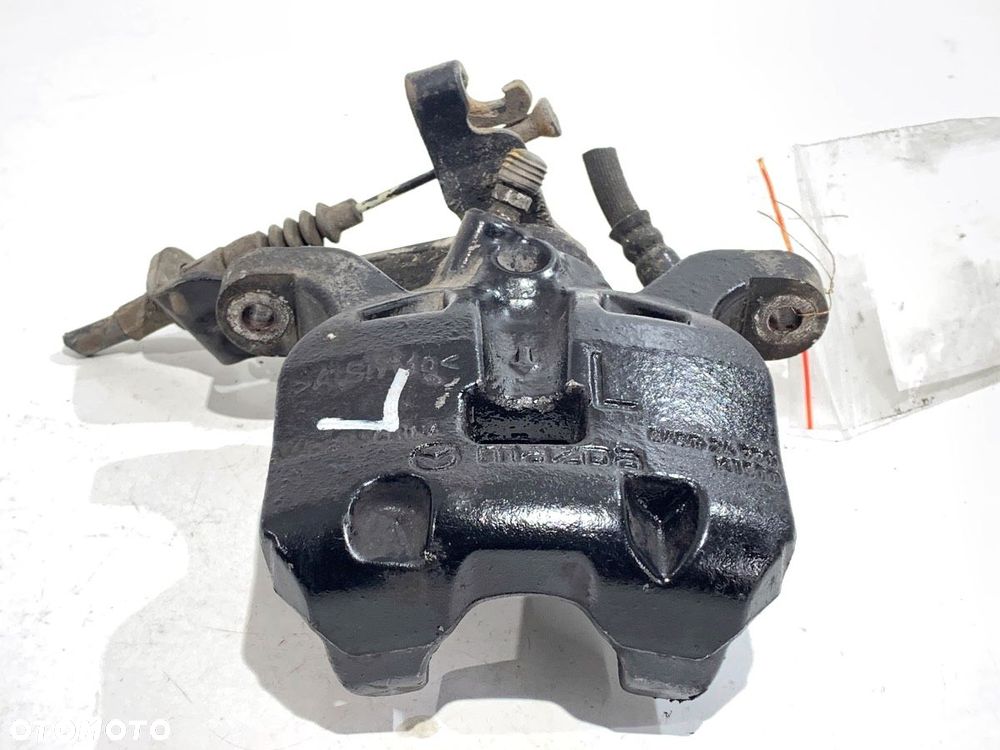 ZACISK LEWY TYŁ  MAZDA 3 (BM, BN) 2013 - 2022 2.0 88 kW [120 KM] benzyna 2013 - 2022 - 1