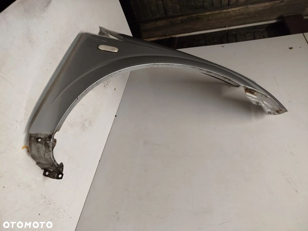 ^ BŁOTNIK PRZÓD PRZEDNI PRAWY SSANG YOUNG KYRON SREBRNY - 3