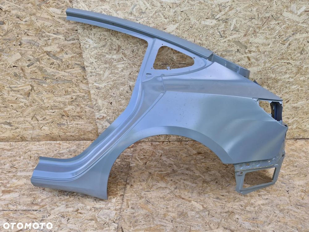 TESLA MODEL 3 BŁOTNIK LEWY TYŁ ORGINAŁ 1073677-ST-B - 1