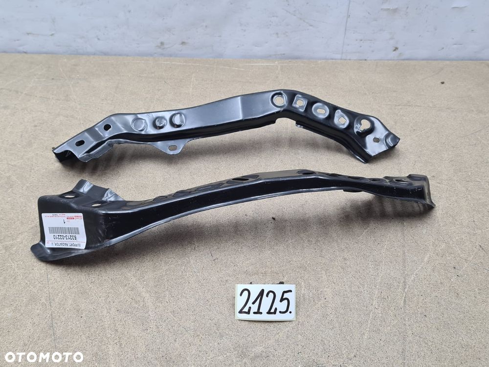 Toyota Corolla E21 53213-02210 wspornik lampy przód przedni komplet R+L - 1