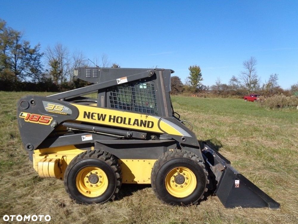 New Holland 2007 New Holland L185 Skid Steer CabHeatAir Pilot CTRLS 2 SPD 2 480 godzin-4200 ładowarka burtowa - 6
