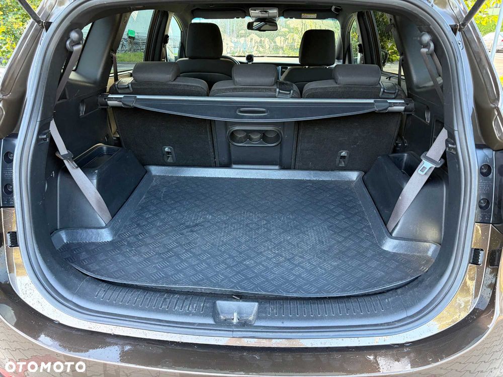 Kia Carens - 8