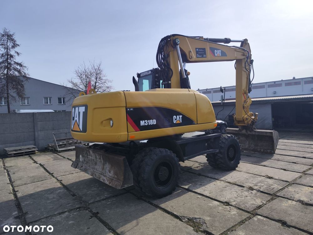 Caterpillar 318D - 9