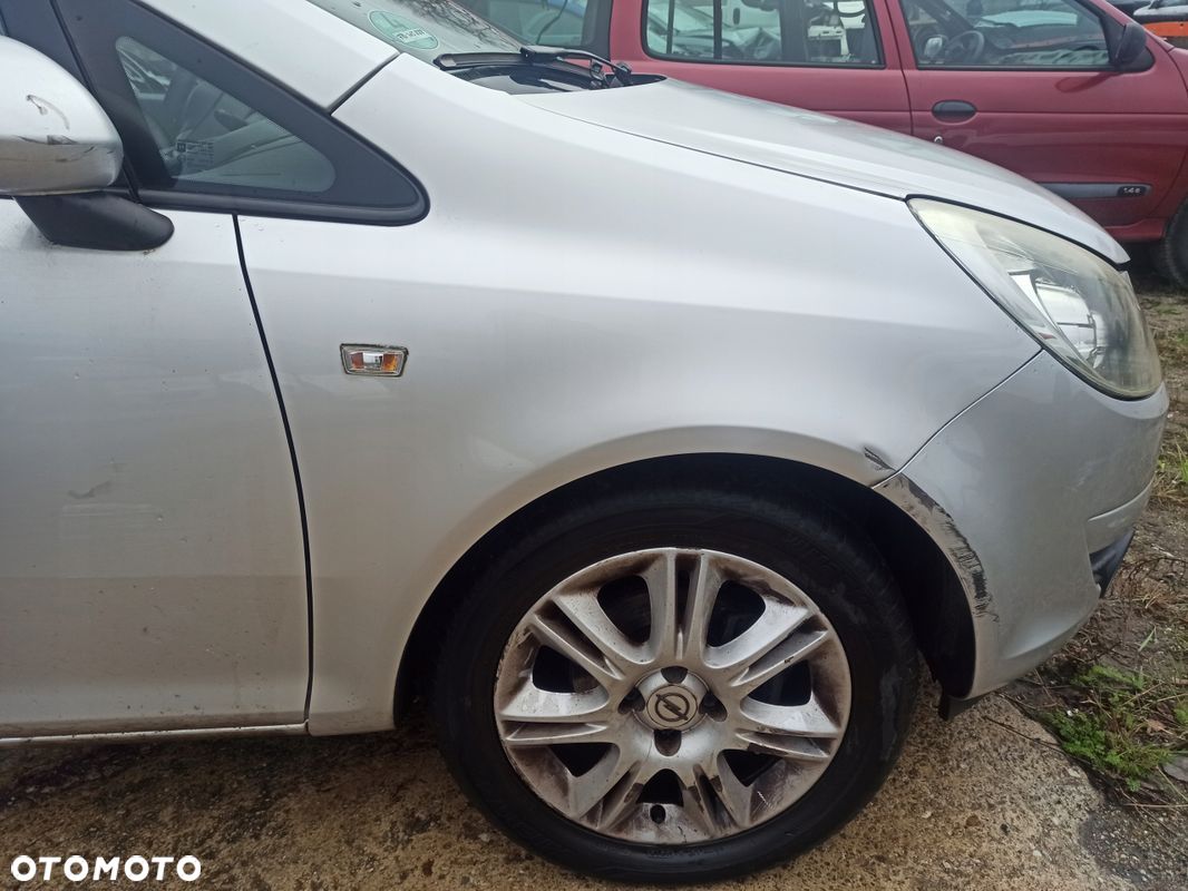 Błotnik prawy przód OPEL CORSA D Z157 06-11 - 1