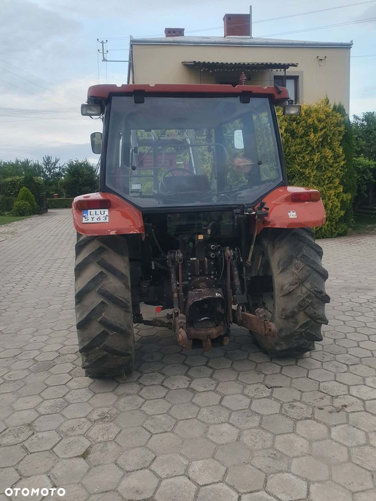 New Holland L65 DT z turem - 4