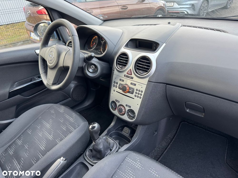 Opel Corsa 1.2 16V Enjoy - 11